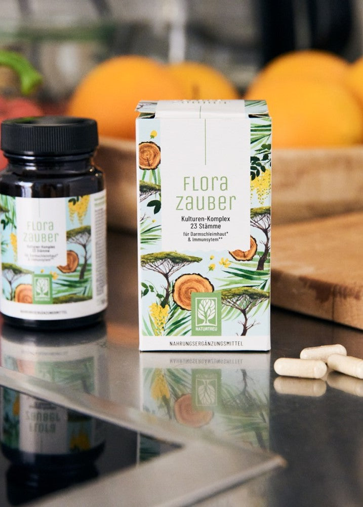 Ansicht der Flasche und Faltschachtel NATURTREU Florazauber Kapseln.